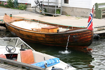 Image showing Small boat with flag