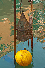 Image showing Venice Italy fishing gear on canal