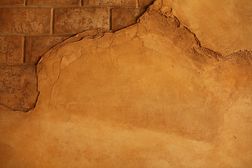 Image showing cracking wall with bricks showing