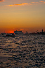 Image showing Venice Italy sunset with cruise boat
