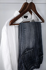 Image showing Man's clothing: blue jeans and white shirt