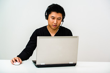 Image showing Asian business man with headset