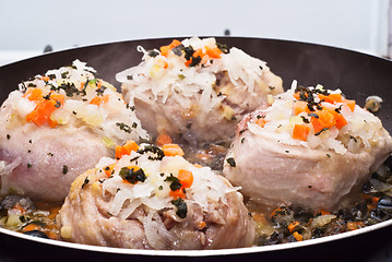 Image showing veal shank cooking in pan