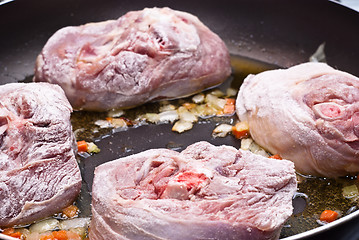 Image showing floured osso buco in pan