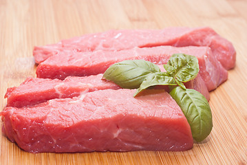 Image showing Raw beef on cutting board