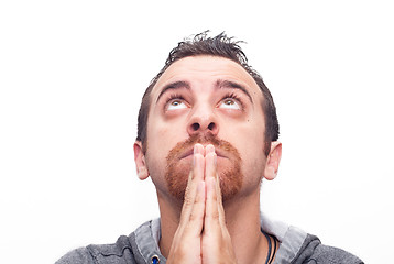 Image showing man praying and looking up