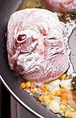 Image showing floured osso buco in pan