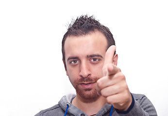 Image showing Young man pointing with fingers