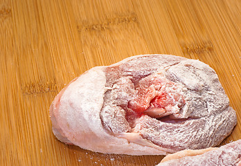 Image showing ossobuco floury on wooden board