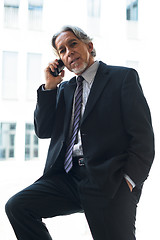 Image showing business man with mobile phone