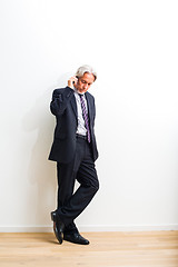 Image showing business man with mobile phone