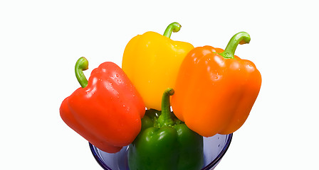 Image showing Four peppers in a bowl