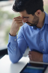 Image showing business man with problems and stress in the office