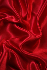 Image showing Smooth elegant red silk as background 