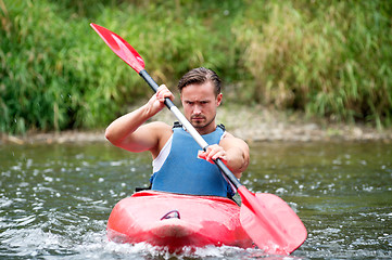 Image showing Man kayaking