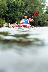 Image showing Man kayaking