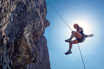 Image showing Abseiling woman