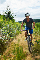 Image showing Man on bike