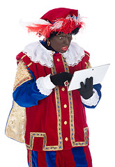 Image showing Zwarte Piet with a tablet