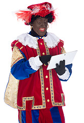 Image showing Zwarte Piet with a tablet