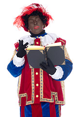 Image showing Zwarte Piet and the book of Sinterklaas