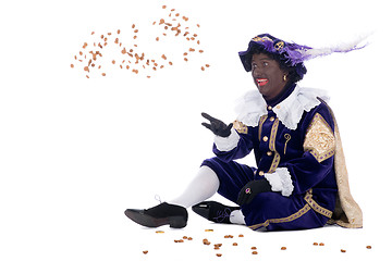 Image showing Zwarte Piet is throwing ginger nuts