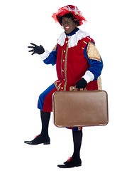 Image showing Zwarte Piet with suitcase