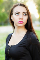 Image showing Young thoughtful woman