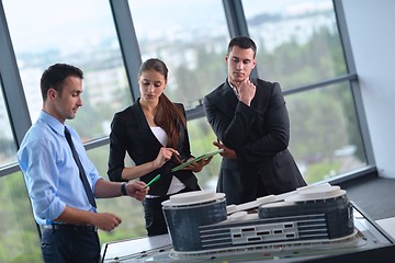 Image showing business people and engineers on meeting