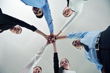 Image showing business people group joining hands