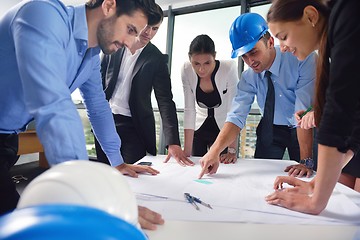 Image showing business people and engineers on meeting