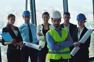 Image showing business people and engineers on meeting