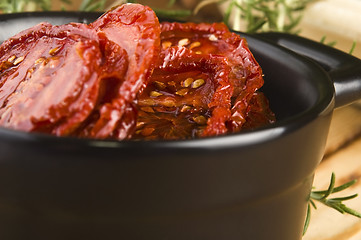 Image showing Sun dried tomatoes with olive oil