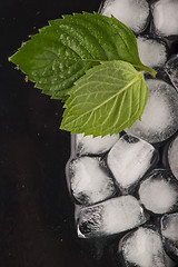 Image showing Ice cubes isolated on black