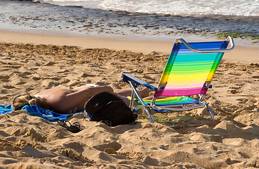 Image showing Woman Sunbathing on Beach 2