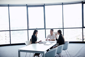 Image showing business people in a meeting at office