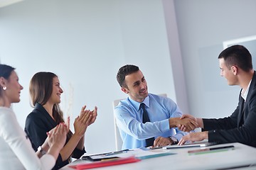 Image showing business people in a meeting at office