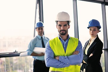 Image showing business people and engineers on meeting