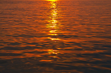 Image showing sunset in ripple water