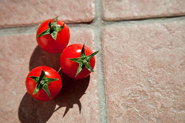 Image showing three cherry tomatoes 