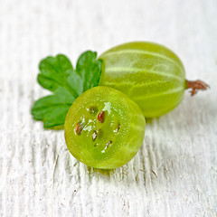 Image showing two gooseberries with leaves