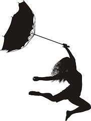 Image showing Woman jumps in the wind