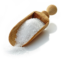 Image showing wooden scoop with white sugar