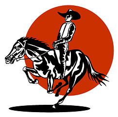 Image showing Rodeo Cowboy Riding Horse