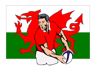 Image showing Welsh Rugby player passing ball