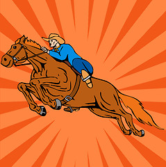 Image showing Rodeo Cowboy Riding Horse