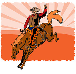 Image showing Rodeo Cowboy Riding Horse