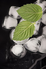 Image showing Ice cubes isolated on black