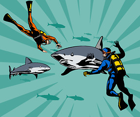 Image showing Scuba Divers and Sharks