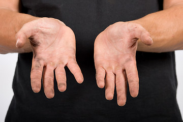 Image showing worker with dirty hands